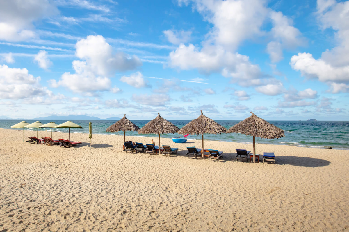 Relaxing view of An Bang Beach with turquoise waters and golden sands in February