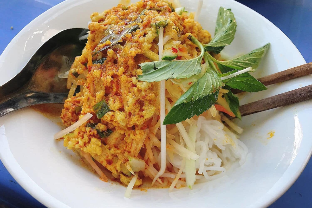 A bowl of Bun Ken, a Phu Quoc noodle dish with coconut milk and fish