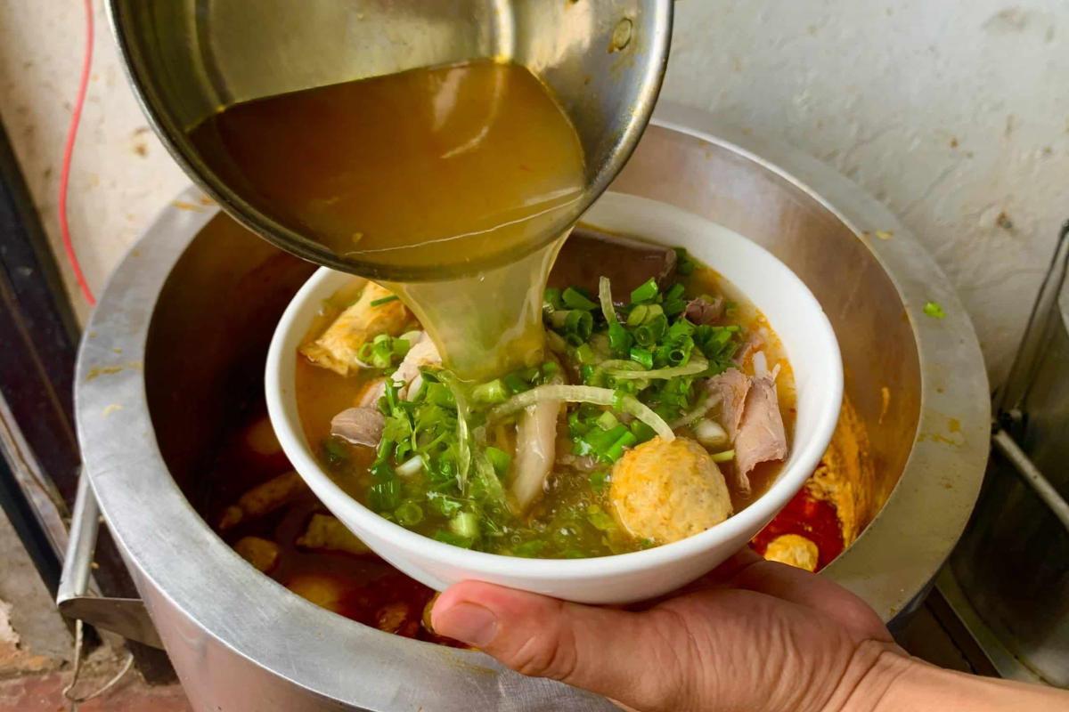 Traditional Hue street food sold by a vendor