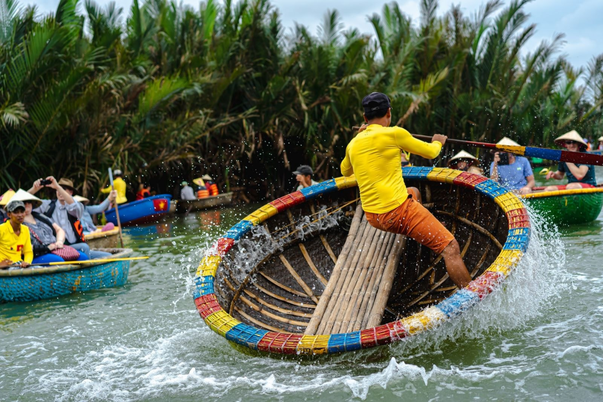 Tourists enjoying a basket boat ride at Hoi An Coconut Village