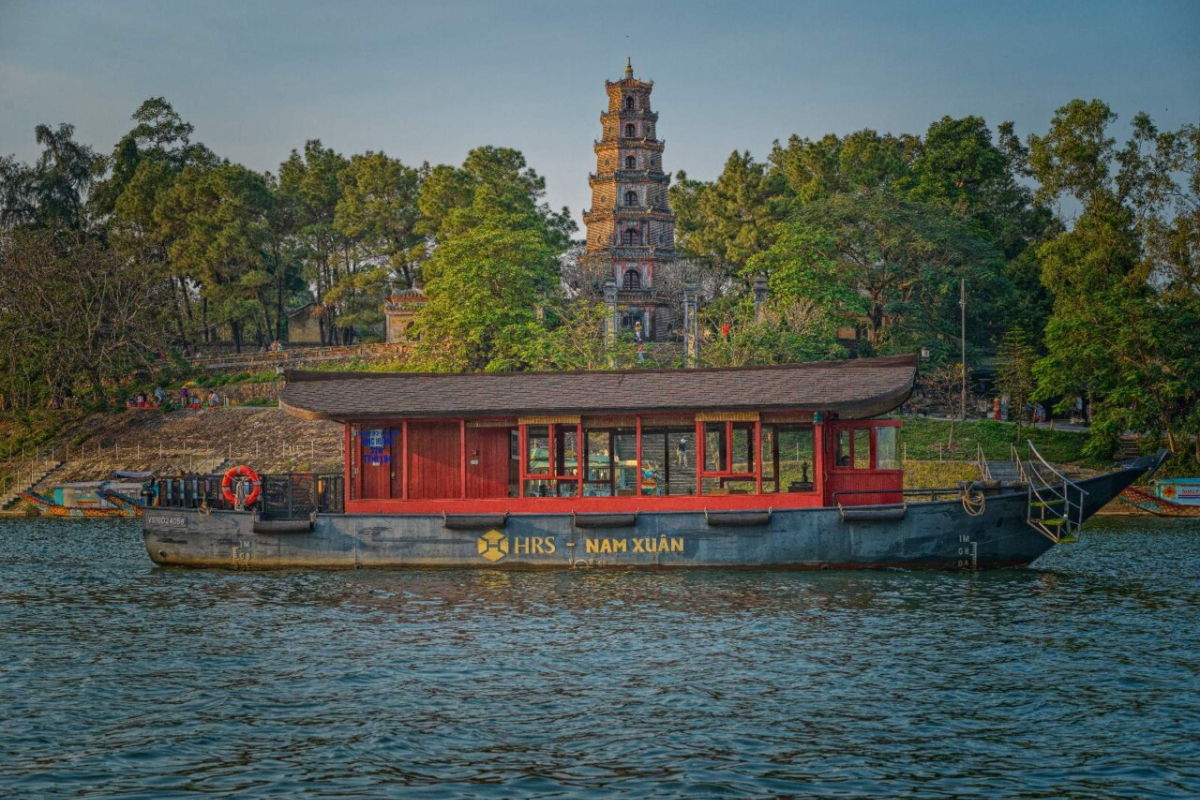Cruise boat sailing down the Perfume River in Hue