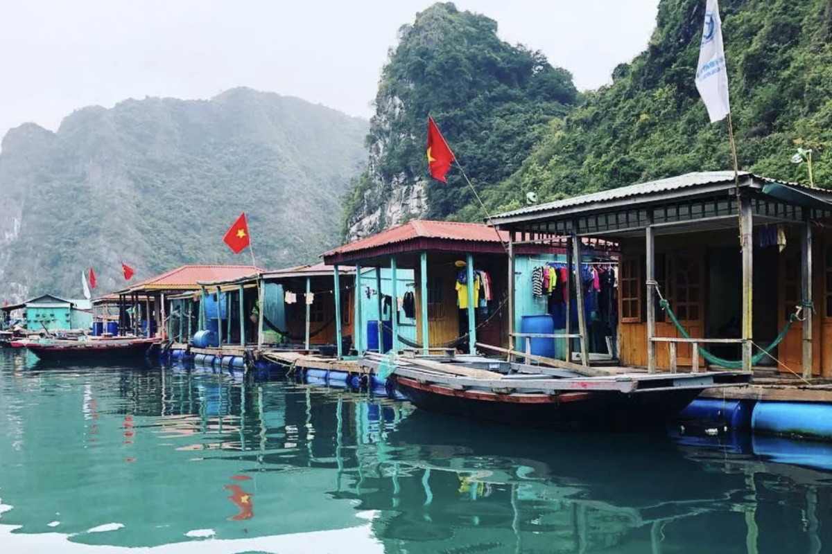 Floating cottages and basket boats in Cua Van Village, Ha Long Bay