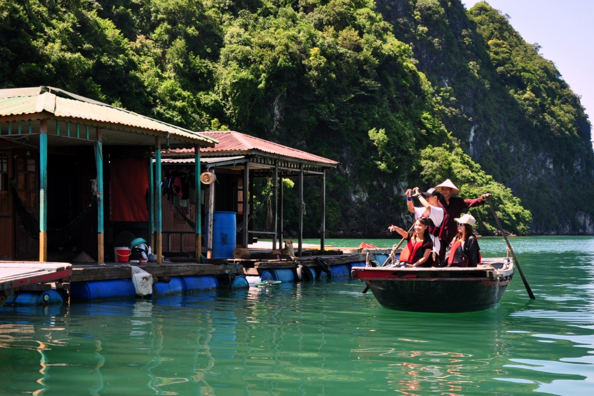 Floating houses and boats at Cua Van Village in Halong Bay