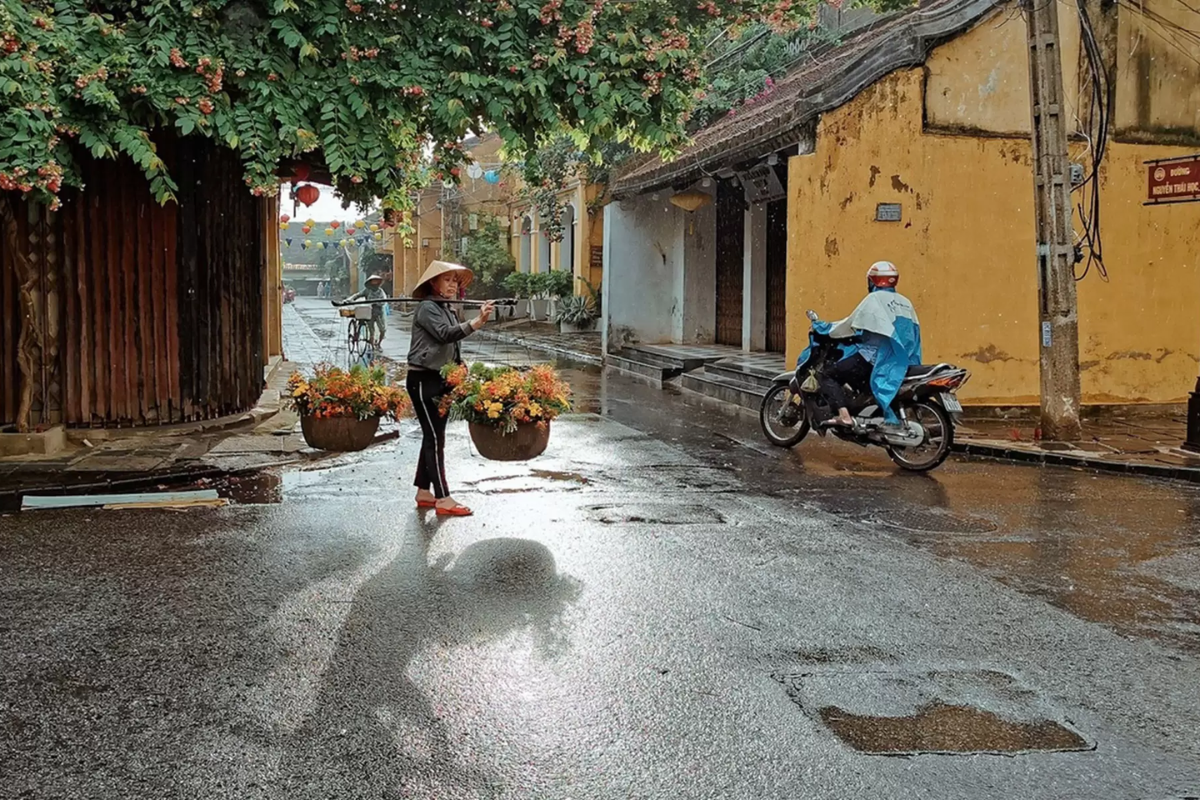 Hoi An street reflections during rainy season