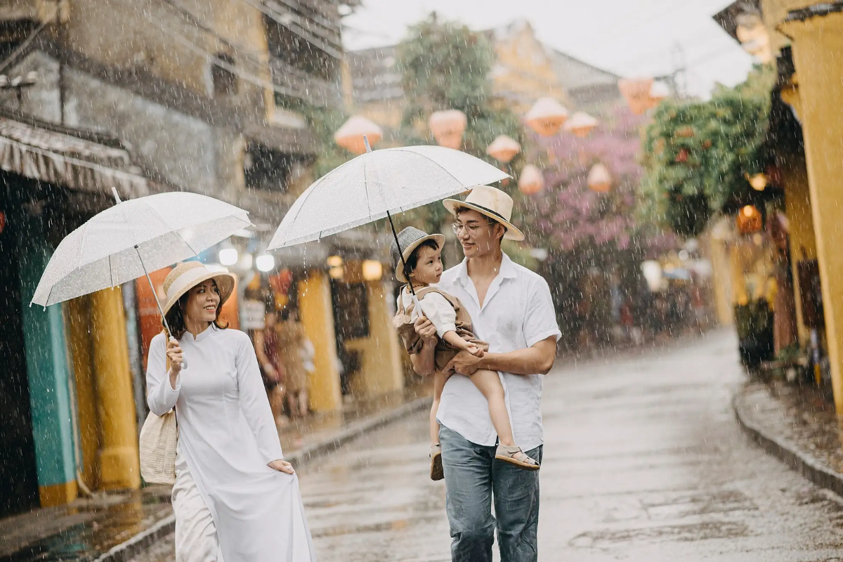 Light morning rain over a Hoi An canal in December