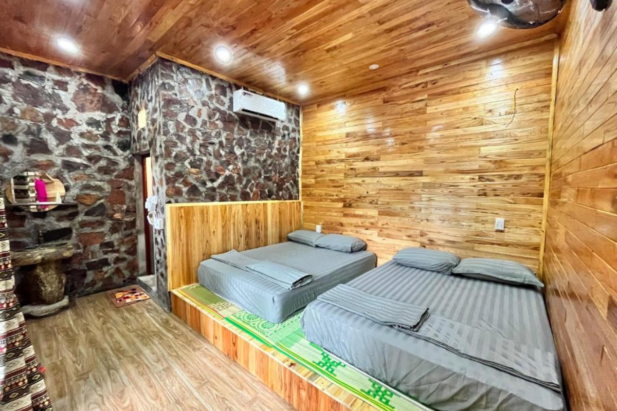 Rustic homestay in a stone stilt house in Khuoi Ky stone village with welcoming local hosts