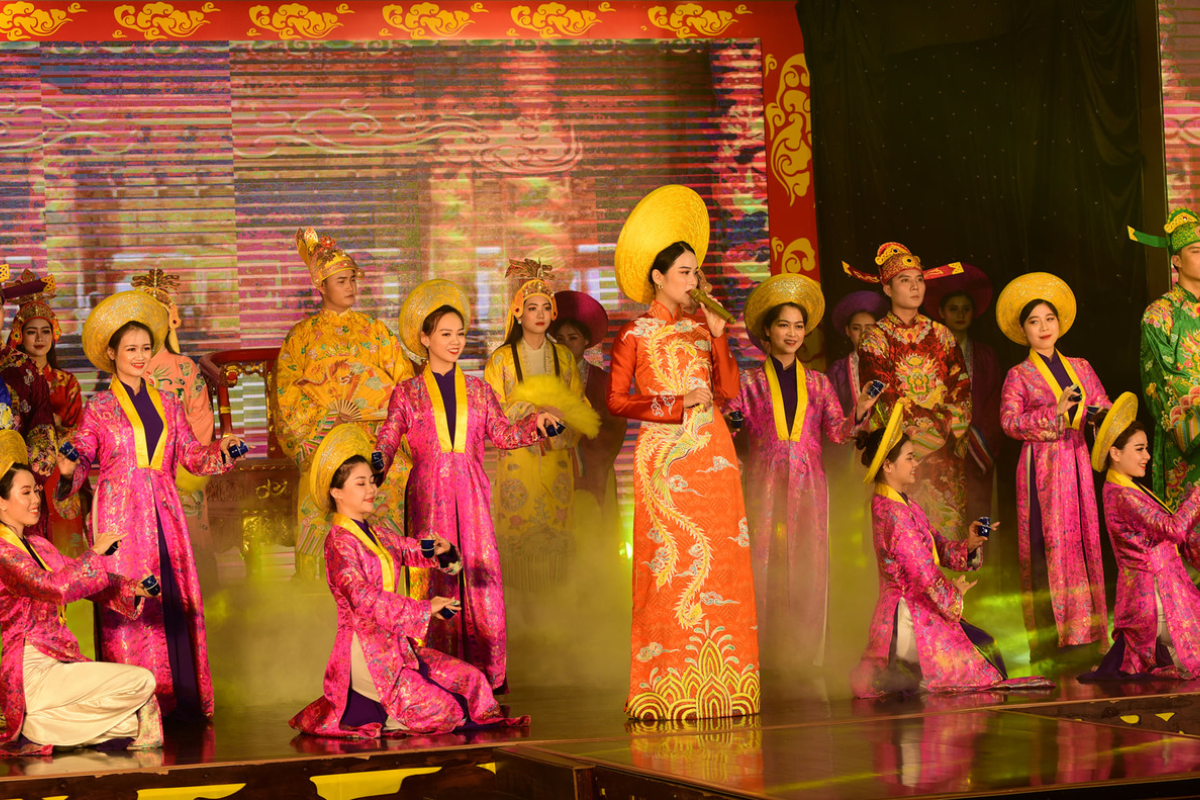 Performers dressed in traditional attire playing Hue Royal Court Music