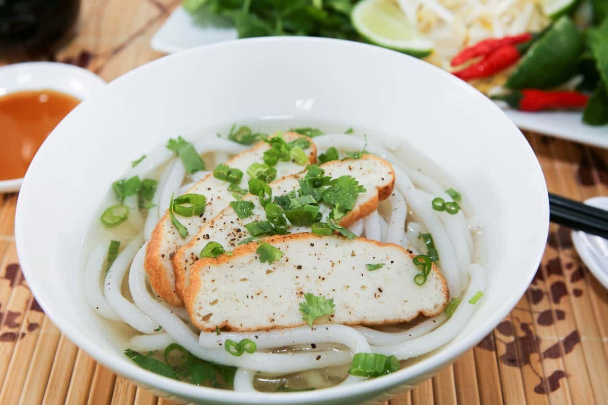 Bánh Canh Cá Thu bowl with grilled mackerel and thick noodles in broth