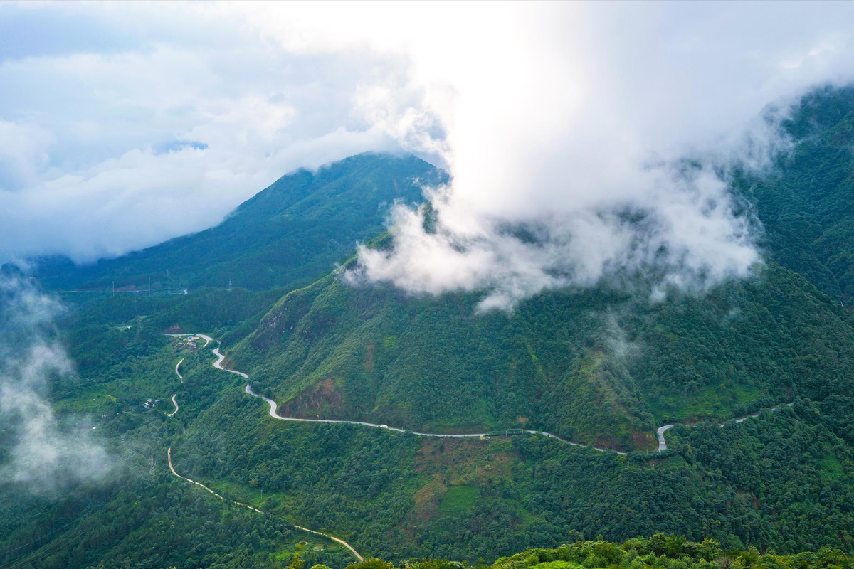 Aerial view of the O Quy Ho Pass winding through the mountains