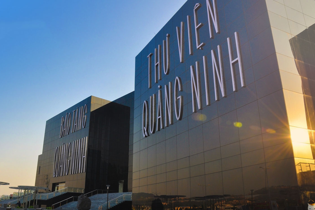 Modern architecture of Quang Ninh Museum with cloudy skies in the background