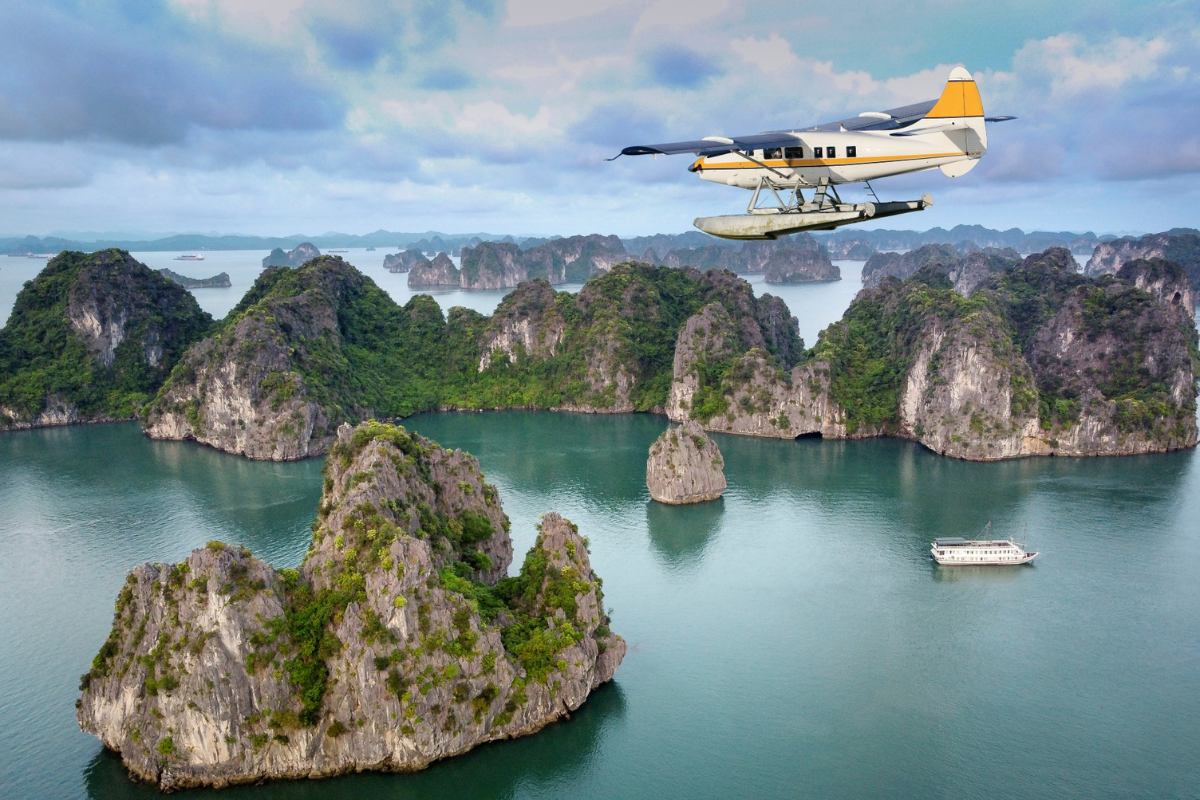 Seaplane flying over Ha Long Bay offering aerial view of islands