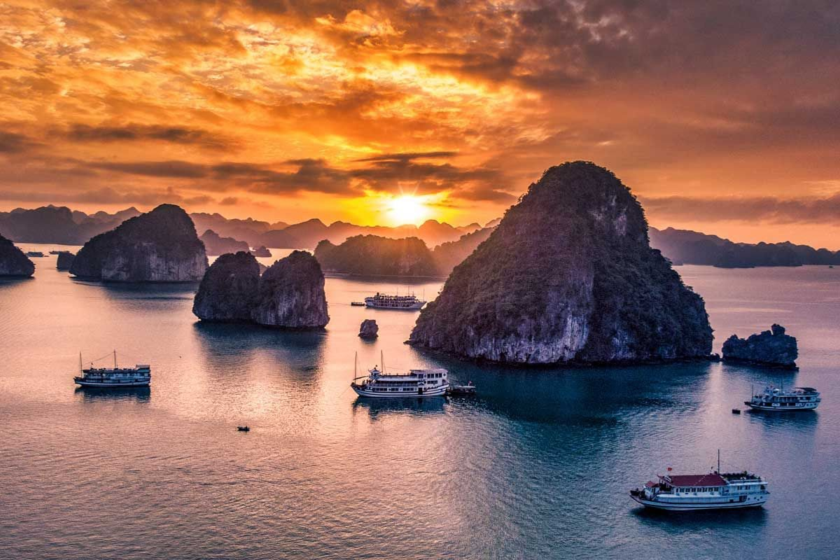 Sunset over limestone islands in Ha Long Bay during November
