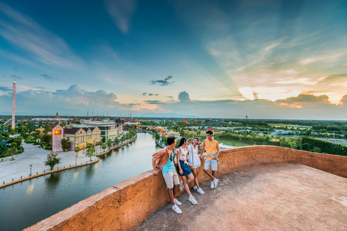 VinWonders Nam Hoi An theme park with visitors enjoying river rides and family activities