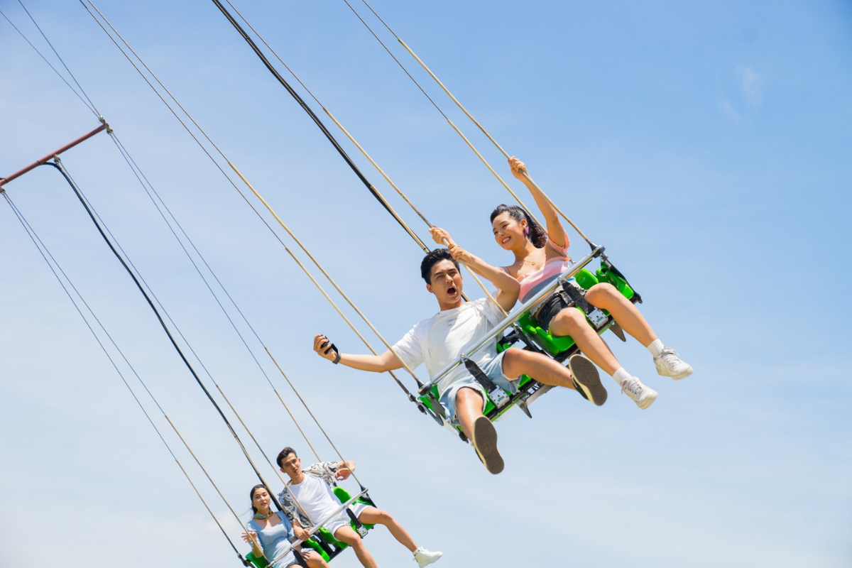 Family enjoying rides and activities at VinWonders Nam Hoi An theme park