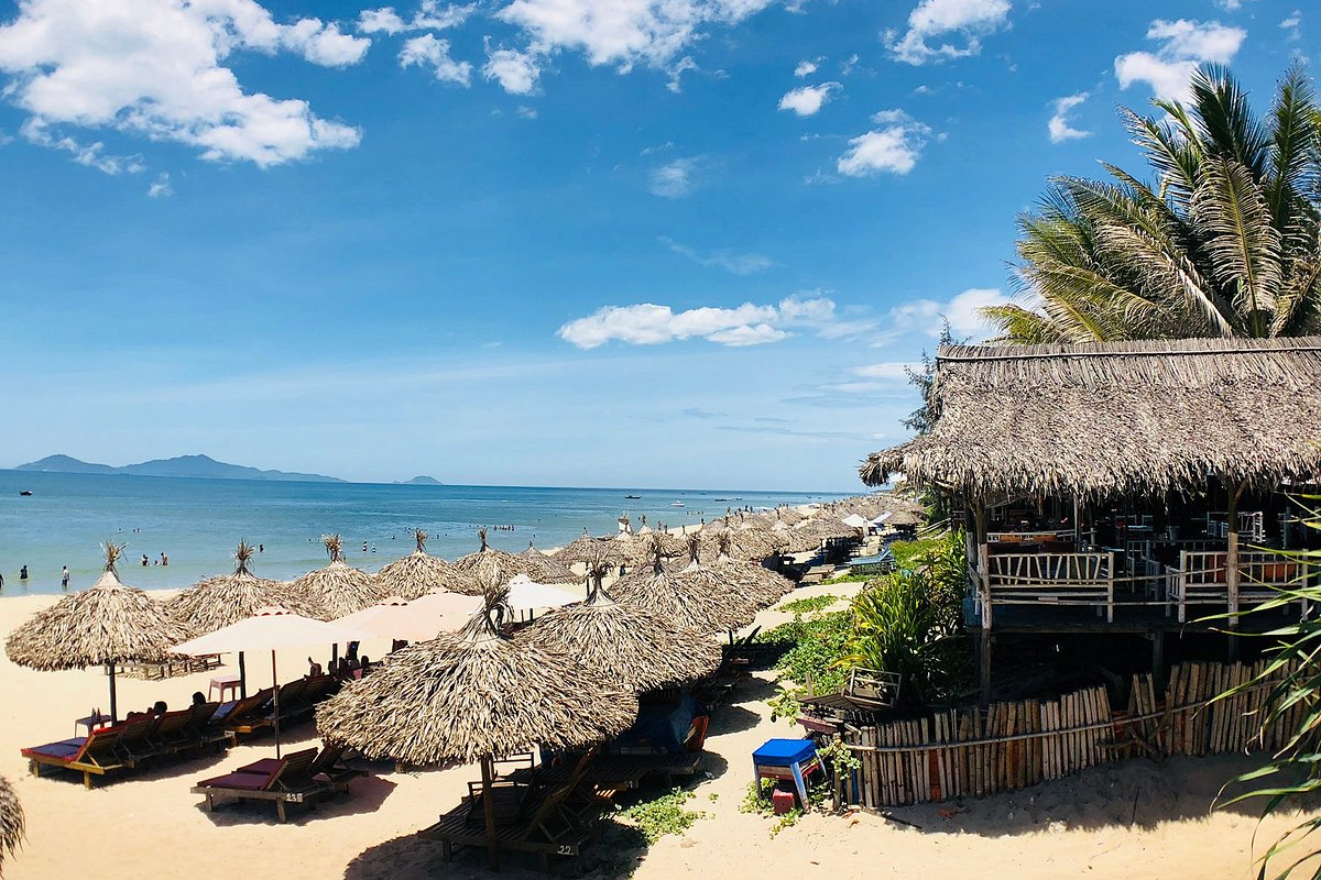 Relaxing scene at An Bang Beach with golden sand and turquoise waters