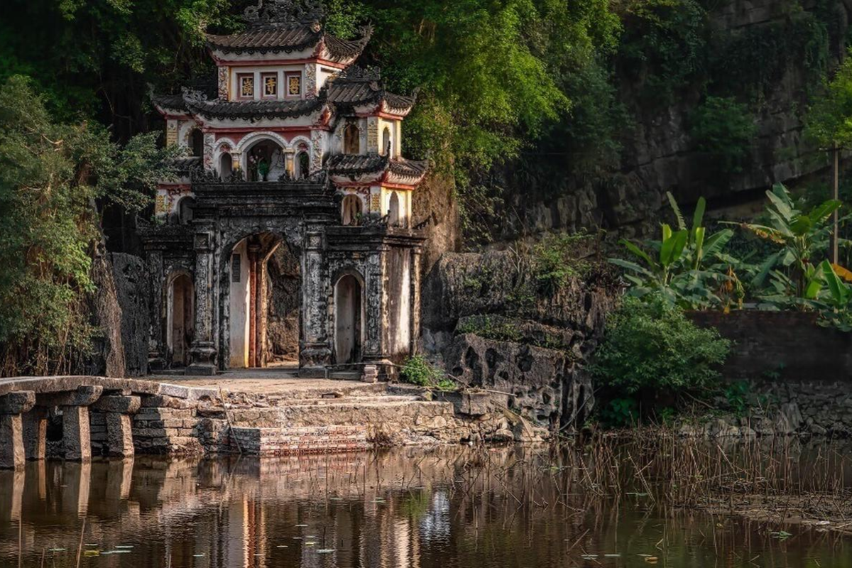 Scenic aerial view of Bich Dong Pagoda nestled in the limestone mountains of Ninh Binh, Vietnam