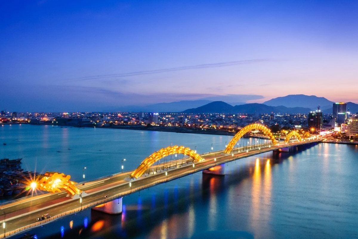 Dragon Bridge lit up at night in Da Nang