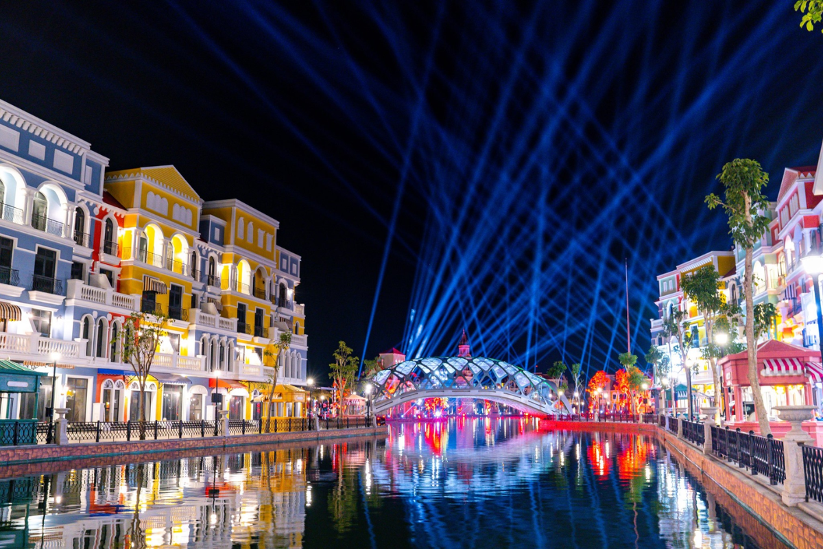 Grand World Phu Quoc at night with vibrant lights
