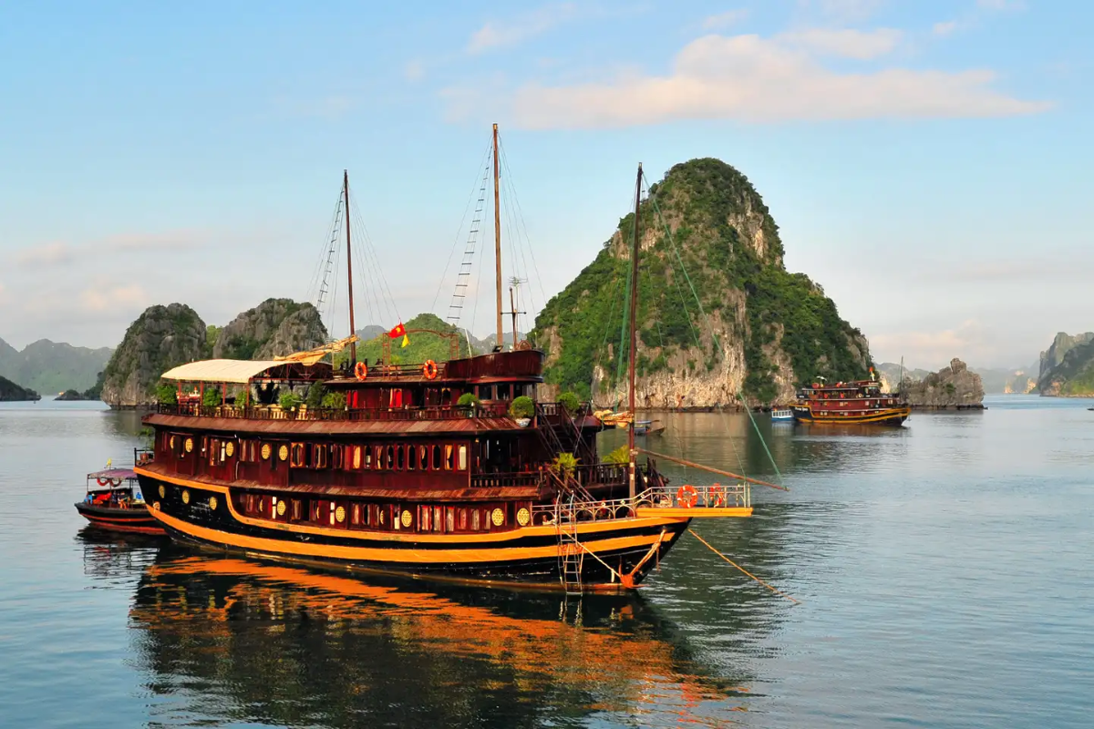 Sunny spring day over Ha Long Bay in April with calm waters and clear skies