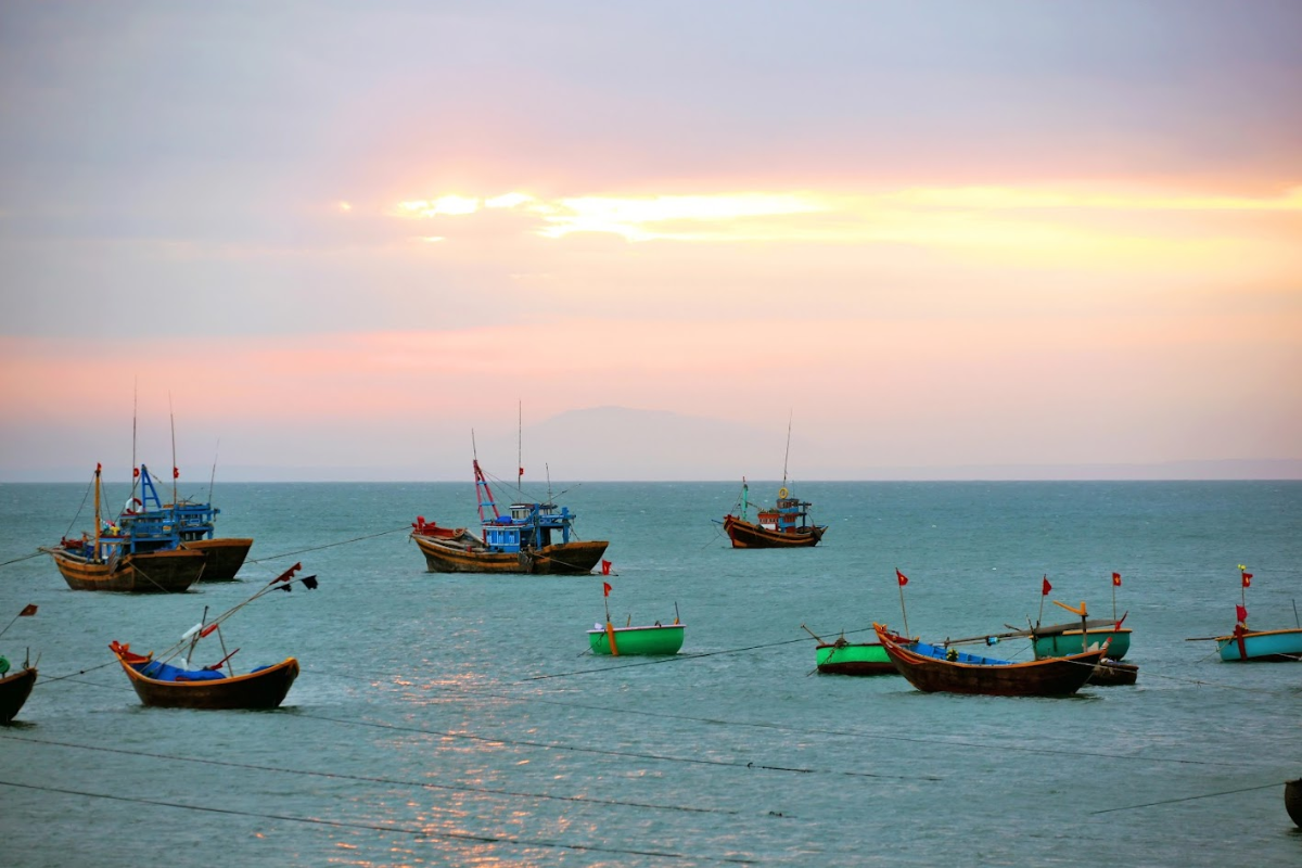 Traditional boats docked at Ham Ninh Fishing Village