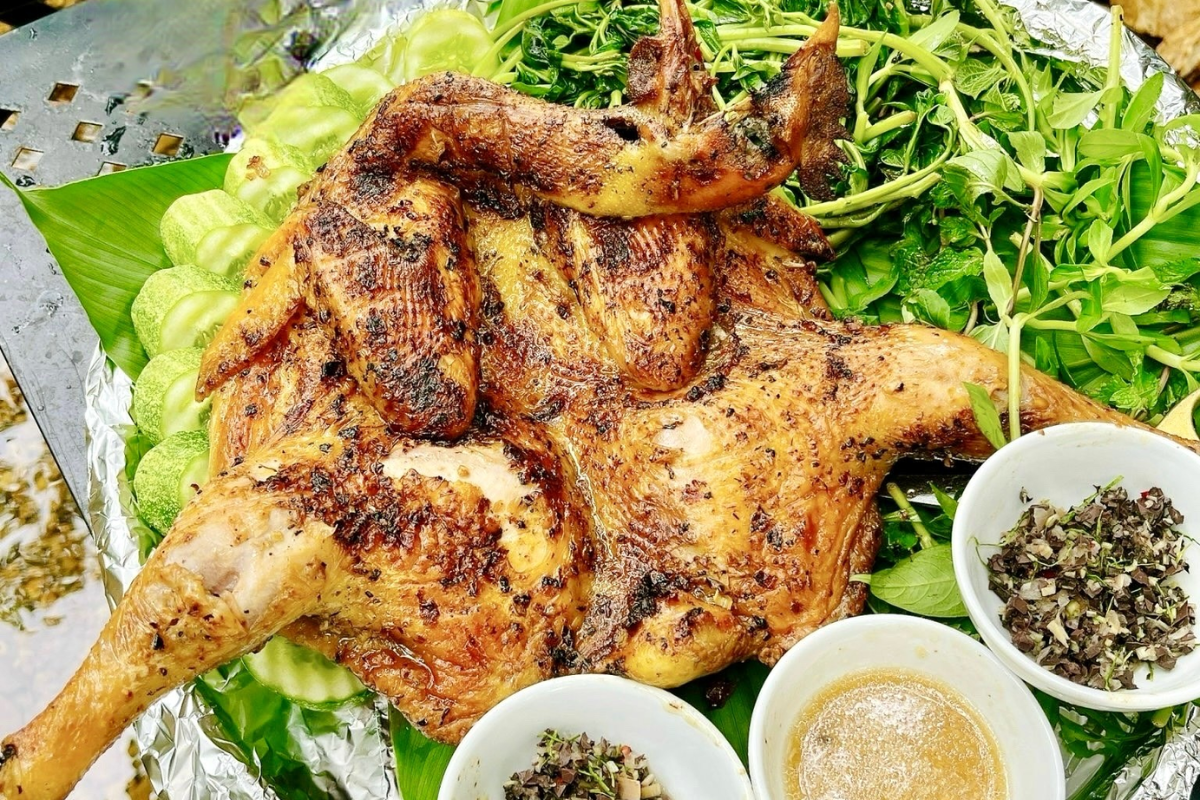 A delicious serving of grilled hill chicken with dipping sauce
