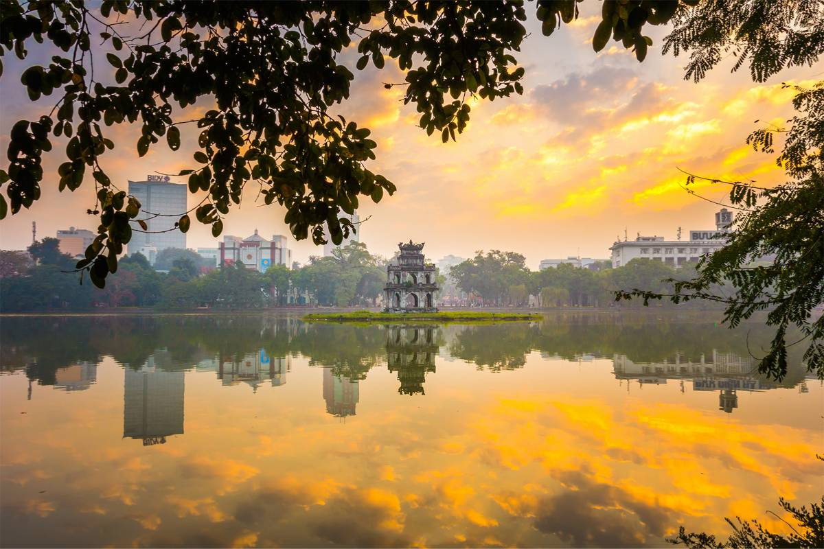 Hoan Kiem Lake with Turtle Tower and reflection in the water