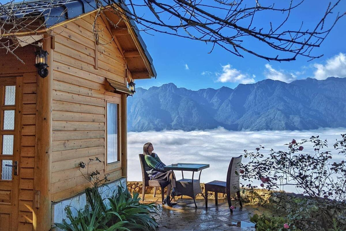 Traditional wooden homestay in a mountain village near Sapa