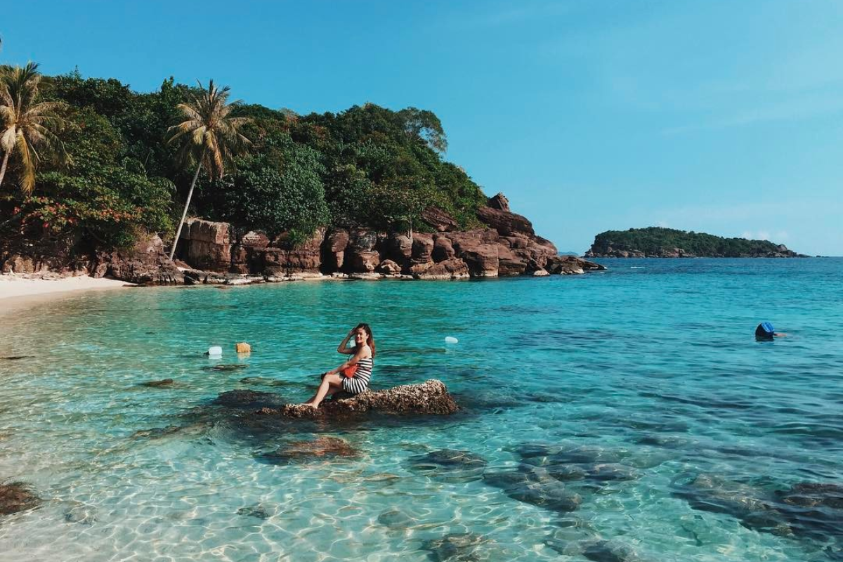 Phu Quoc beach in August with clear skies and blue waters