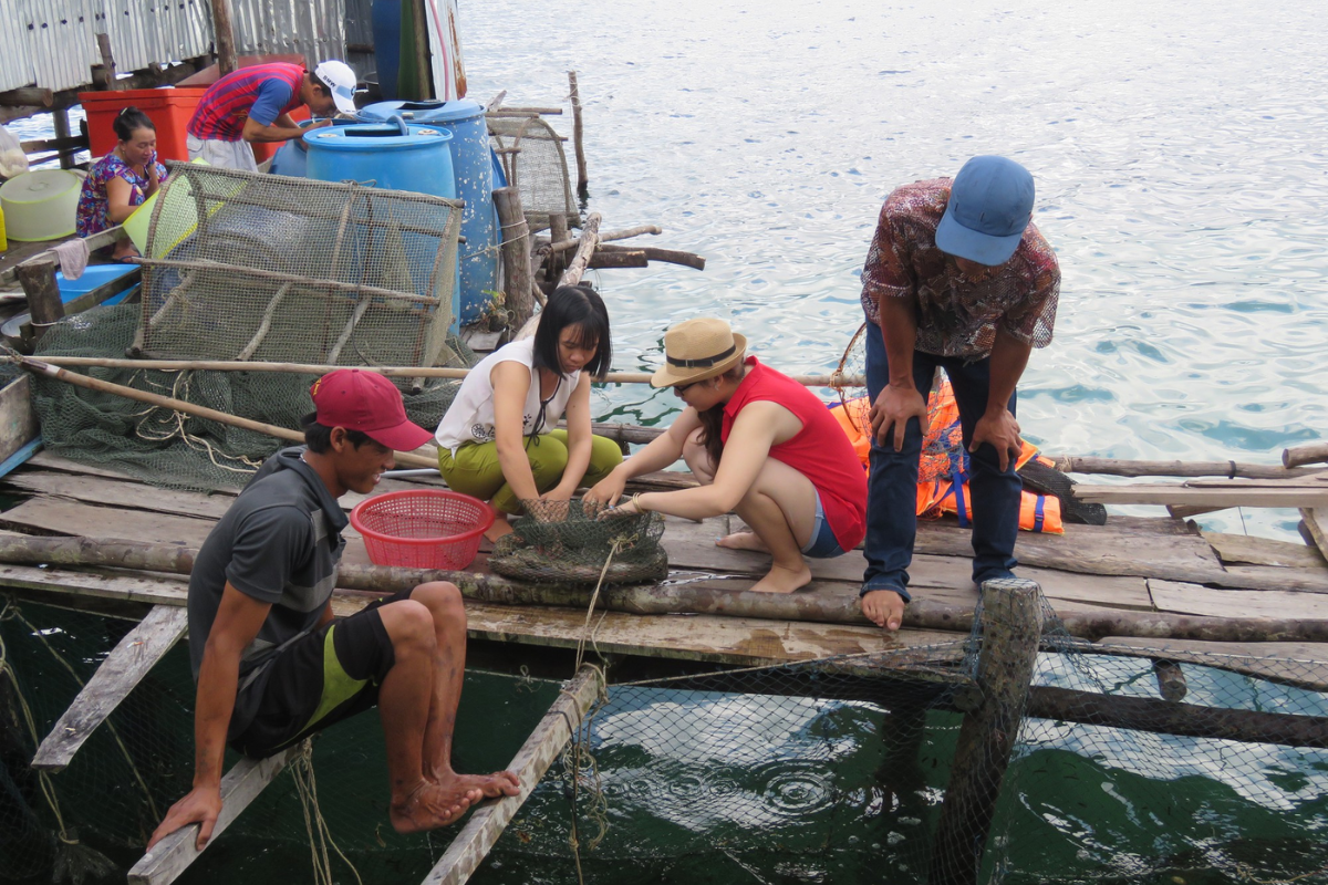 Local fishermen working at Rach Vem Fishing Village