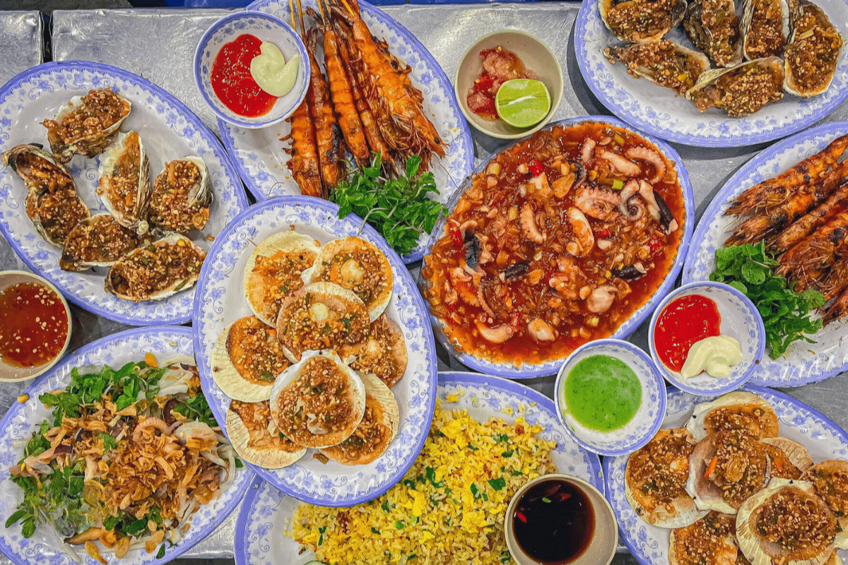 A plate of fresh seafood served at a beachside restaurant in Non Nuoc Beach