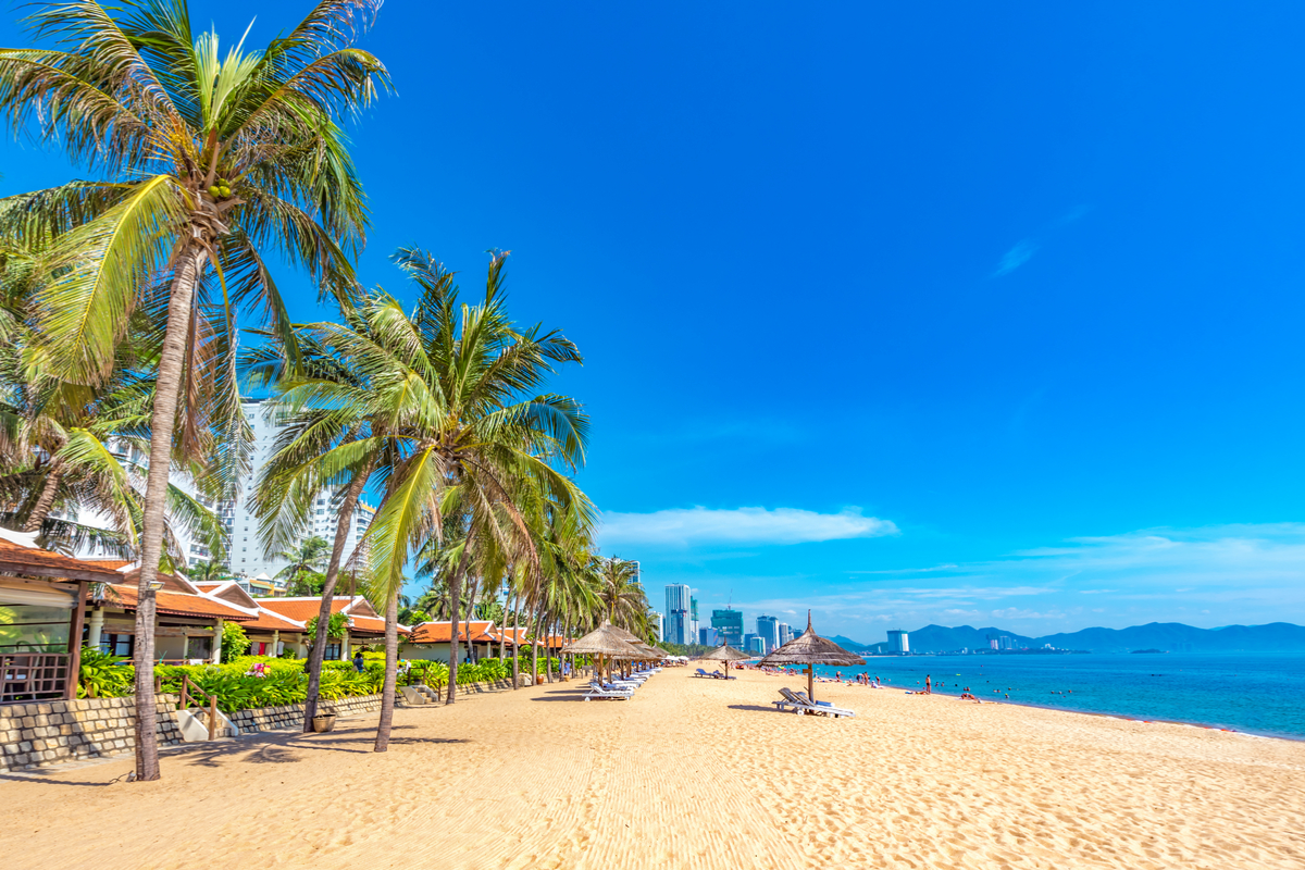 Sunny beach in Nha Trang during January with clear skies and calm sea