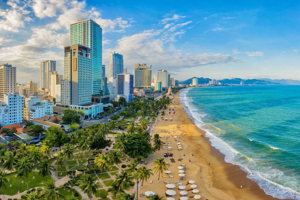Sunny beach in Nha Trang with turquoise waters and golden sand in April