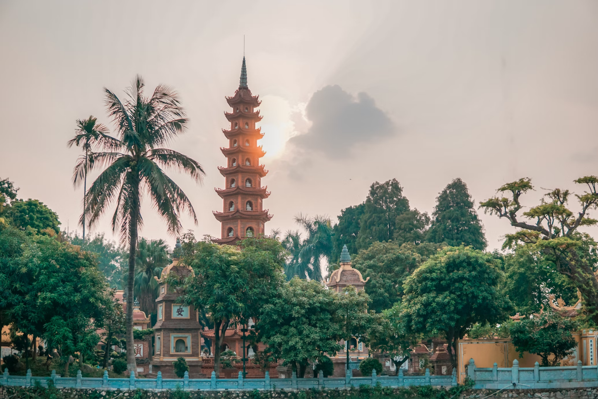 Tran Quoc Pagoda beside the peaceful waters of West Lake in Hanoi
