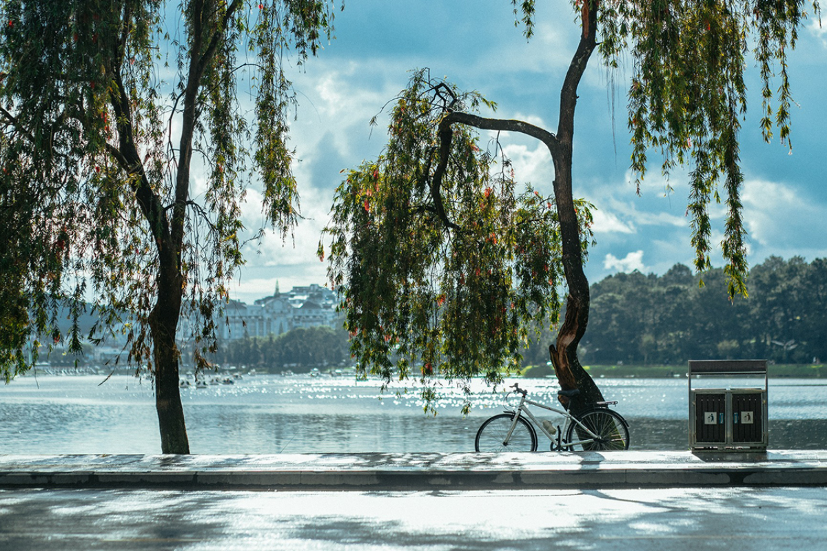 View of Xuan Huong Lake surrounded by gardens and walking paths
